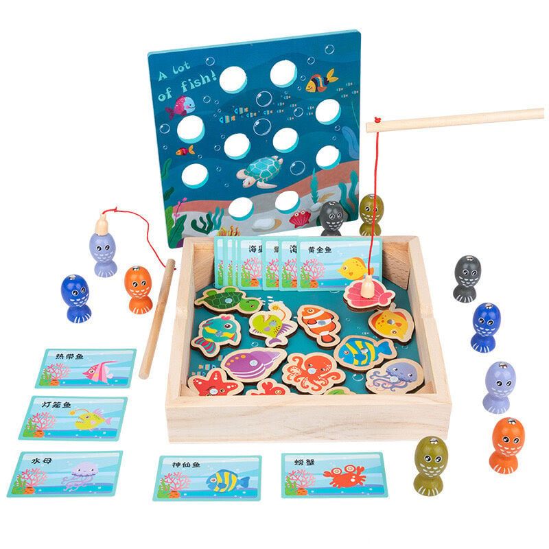 Магнітна риболовля С 75557 (24) дерев’яний ящичок, кришка з отворами, 16 фігурок рибин з магнітами, 2 магнітні вудочки, тематичне ігрове поле